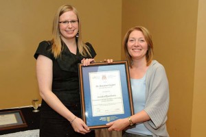 Award of Excellence Presented to Ms. Nicole Stockley (MUN Medical Student), on behalf of Dr. Roxanne Cooper. This award was presented by Dr. Jacqueline Elliott, Honorary Treasurer, NL College of Family Physicians