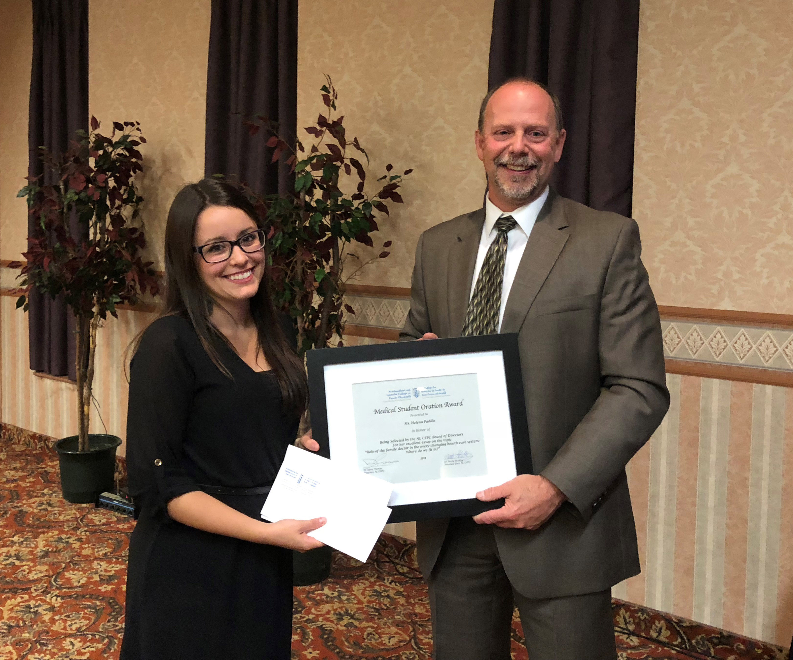 Dr. Sonny Collis presenting Dr. Helena Paddle with the 2018 Medical Student Oration Award