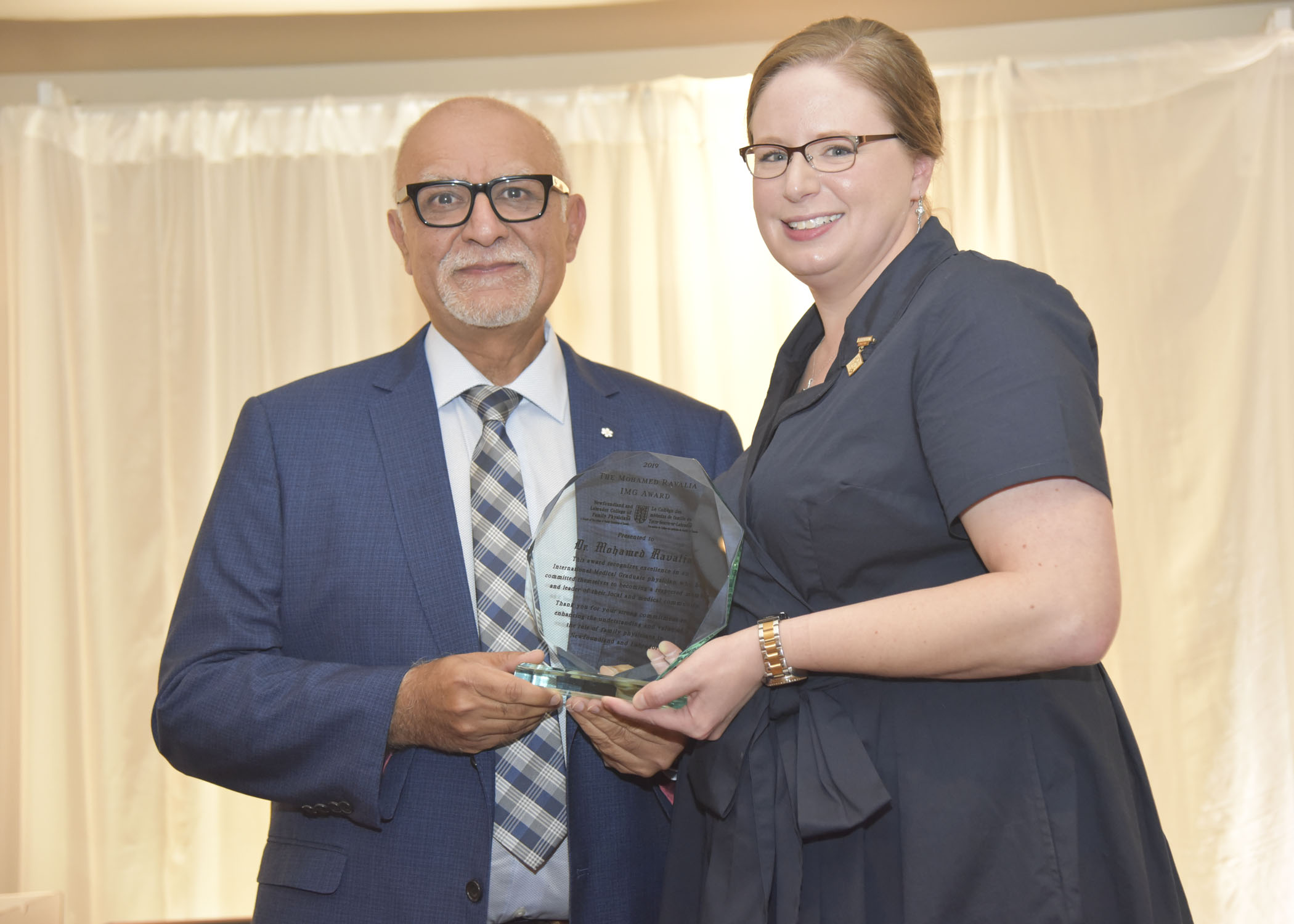 <b>2019 Dr.  Mohamed Ravalia IMG Award – Dr. Mohamed Ravalia</b> <br /> Presented by Dr. Nicole Stockley, President, NL CFP
